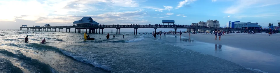 Pier 60 stretching across the Clearwater Beach shoreline in evening light