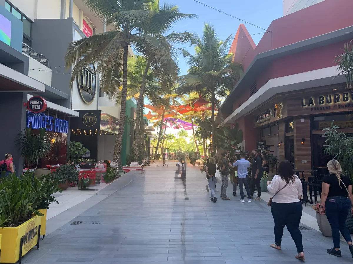 Colorful umbrellas above the restaurant walkway at Distrito T-Mobile