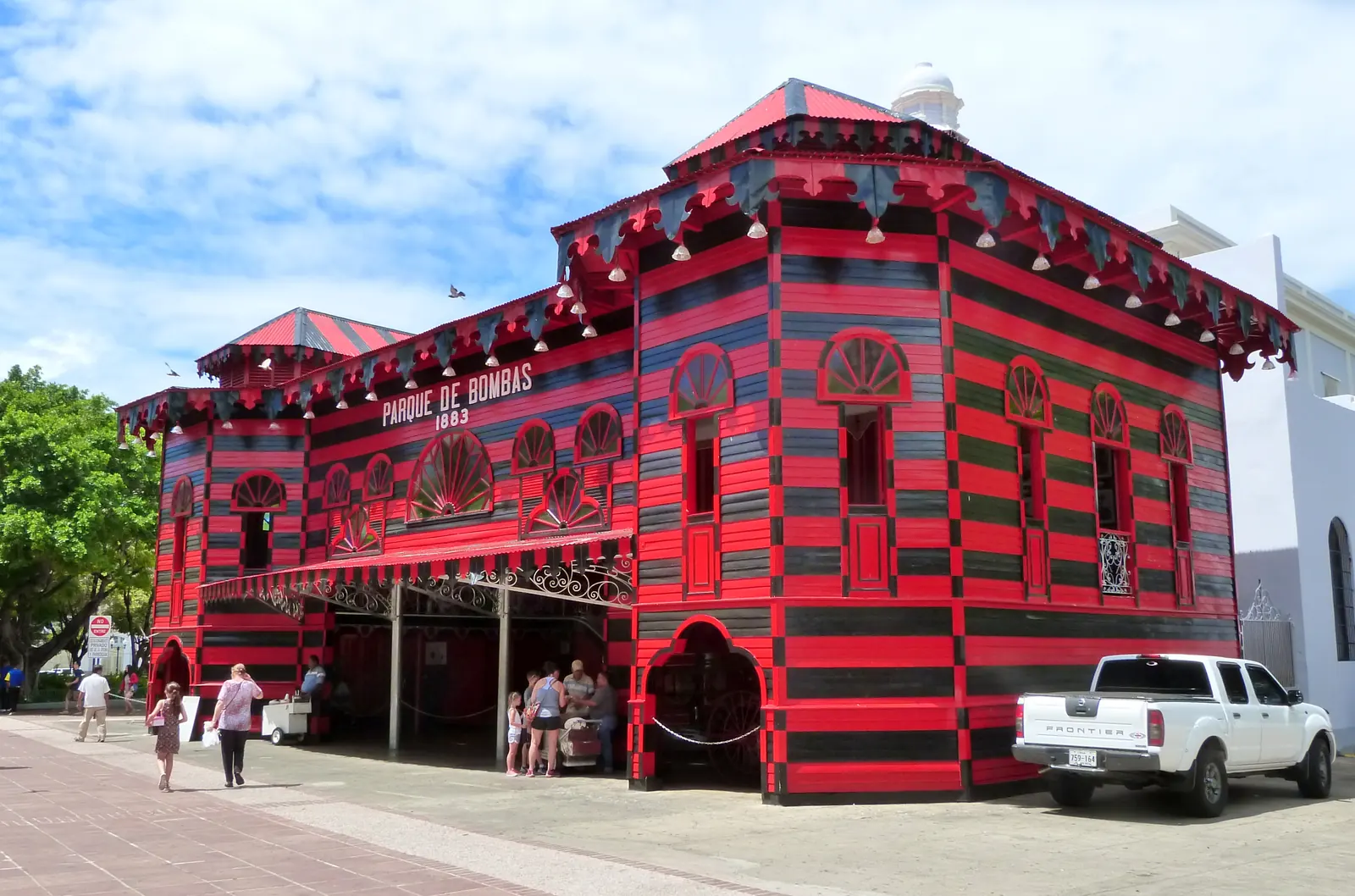 Red-and-black Parque de Bombas building in Ponce