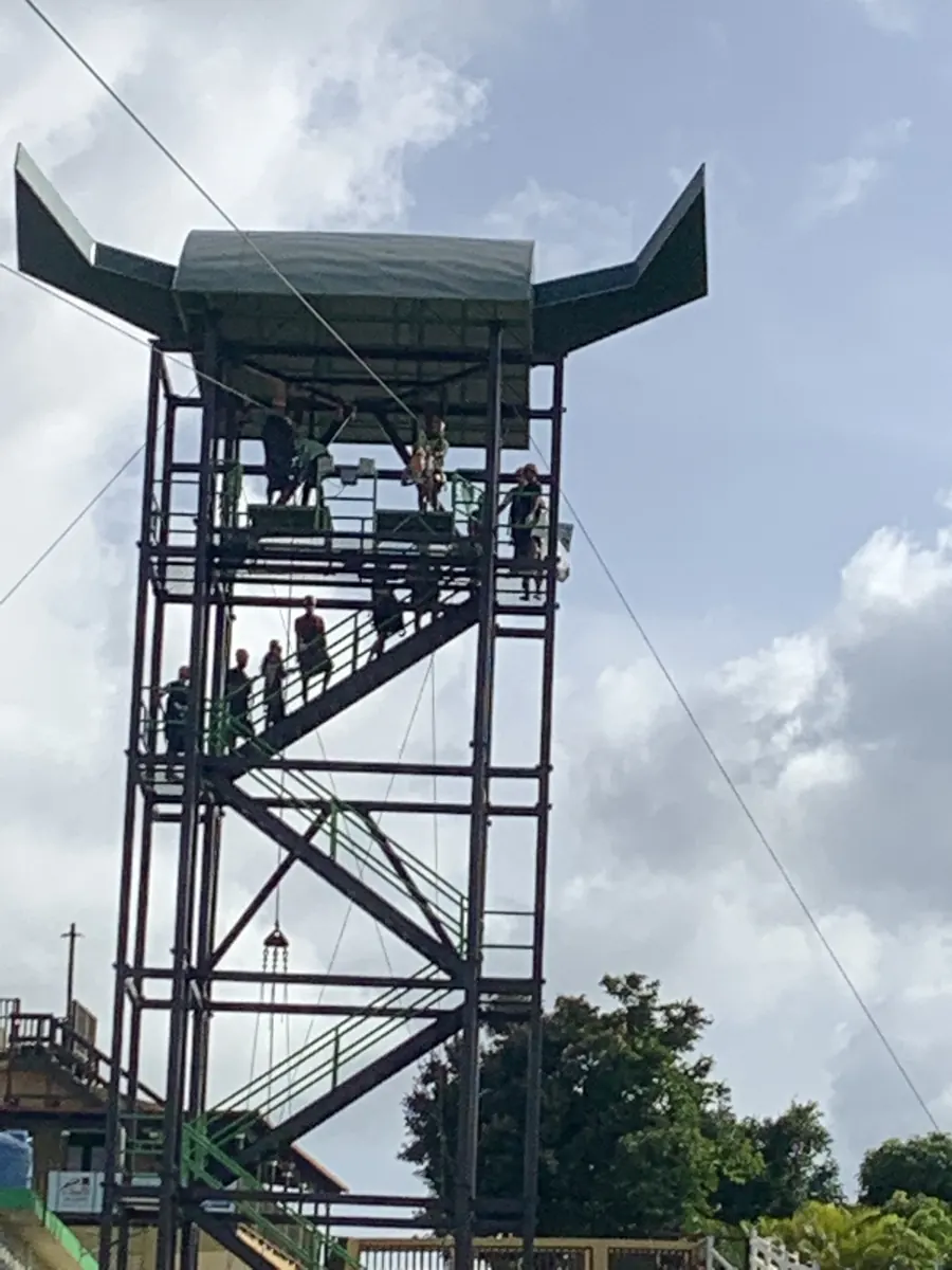 Tall zipline tower at Toro Verde above the mountain landscape