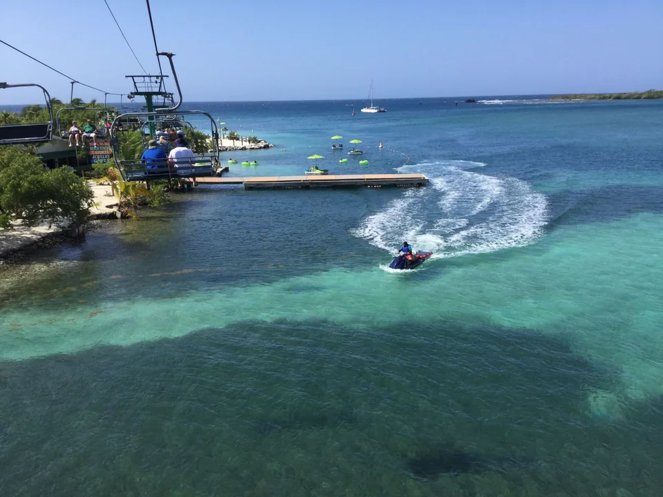 Scenic chairlift above the lagoon beside Mahogany Beach